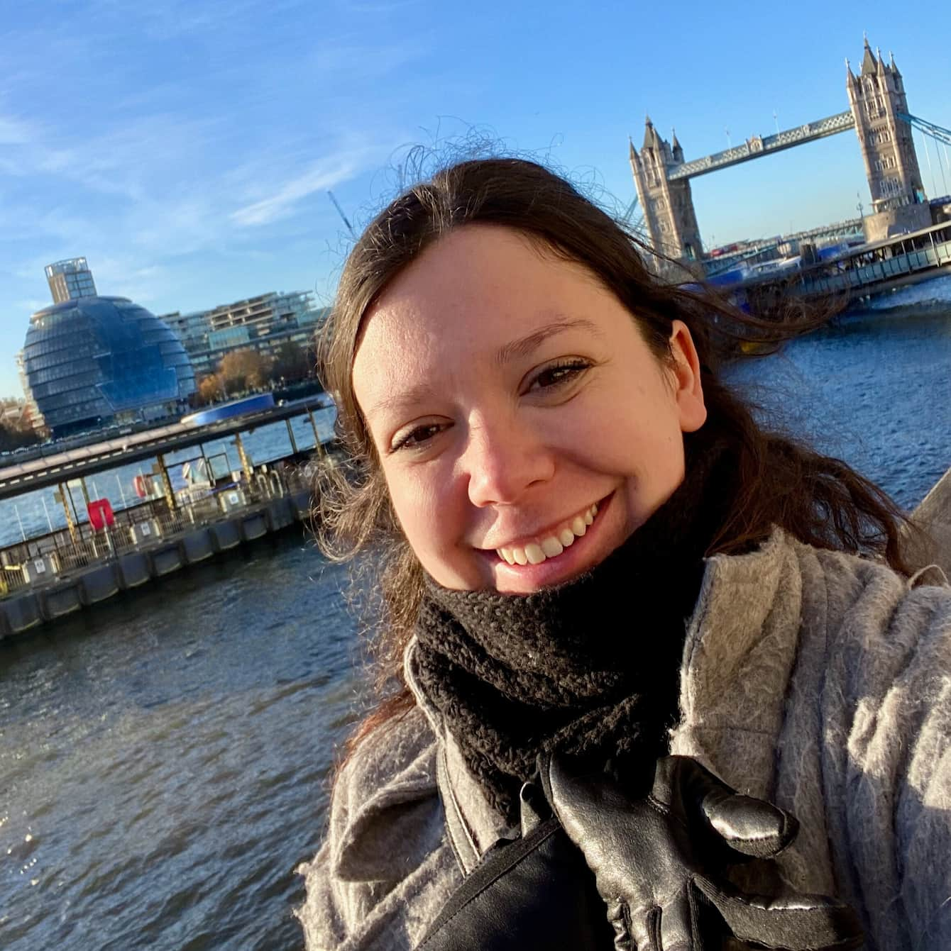 A selfie of Trinity Conn in front of London Bridge.