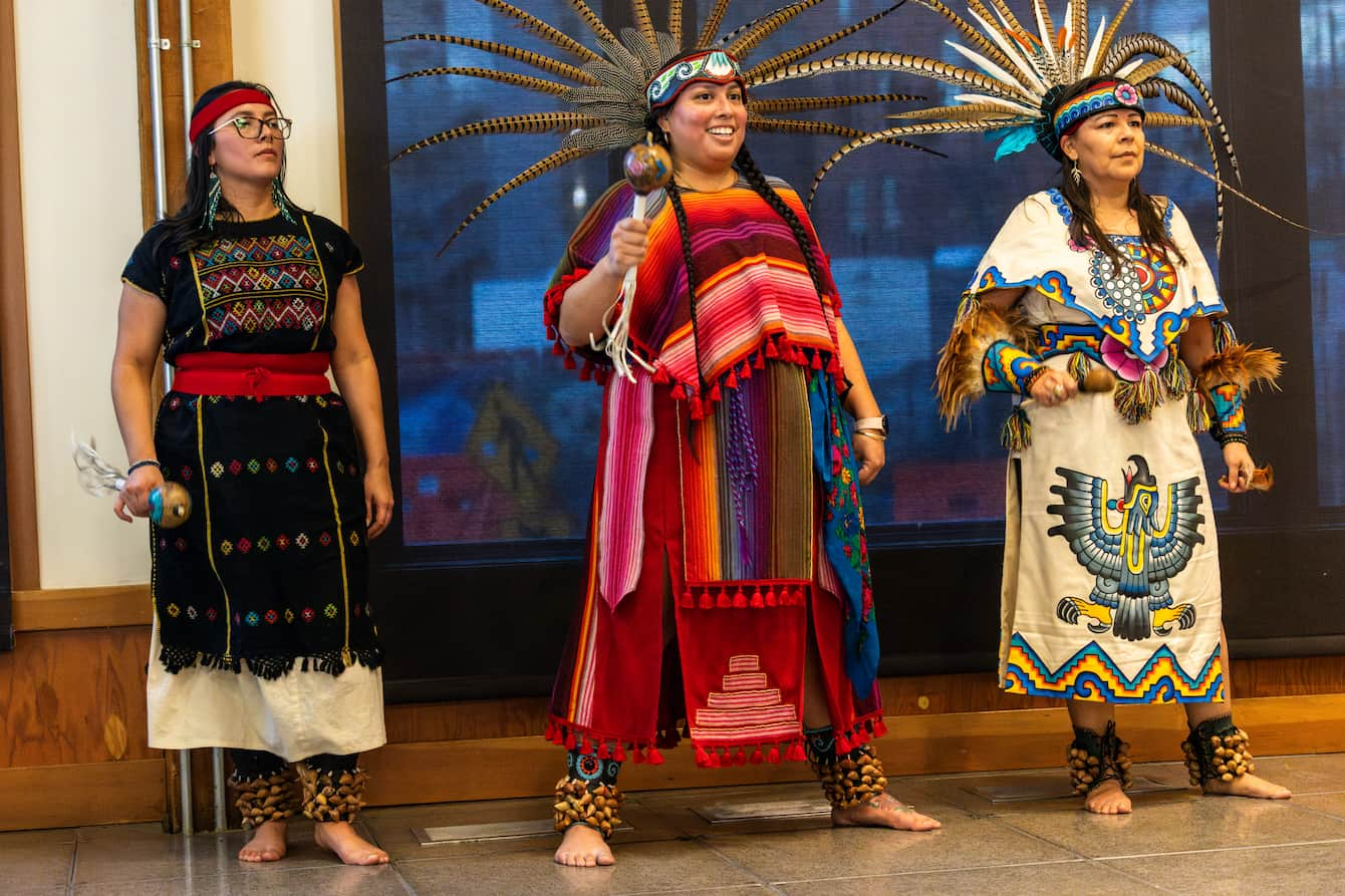 Three members of TLALOKAN dance group.